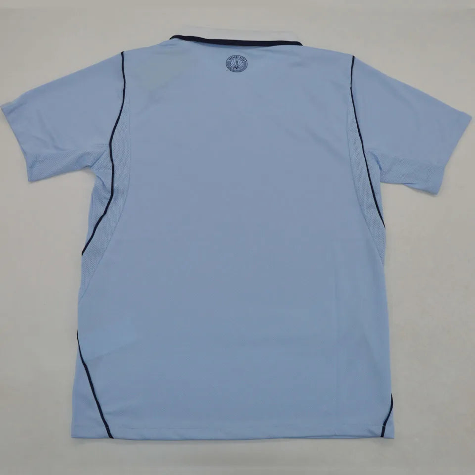 2026/27 Uruguay Home Fans Soccer Jersey (Have Right Patch 有右臂章 金底白字） Detail 1